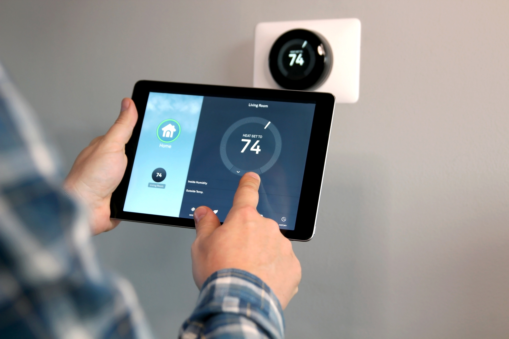Using tablet to adjust smart thermostat